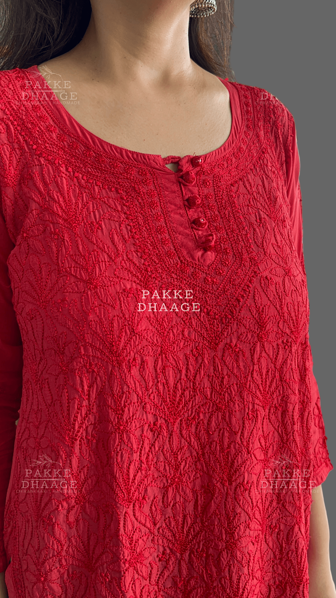 woman wearing a Red hand embroidered chikankari short top