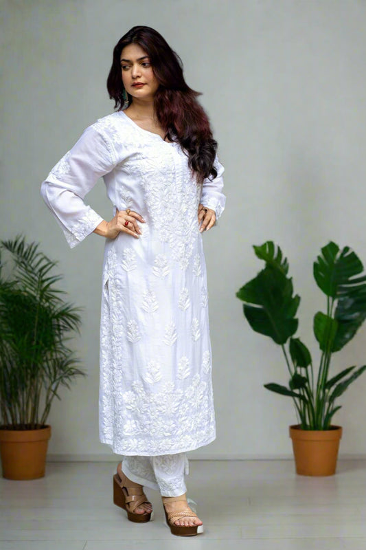 Woman wearing a white traditional handmade chikankari outfit